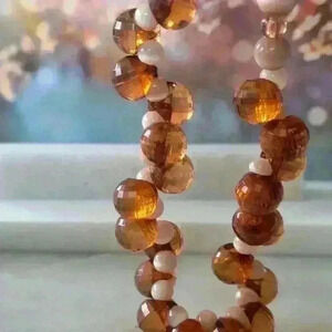 Amber and beije plastic beaded  necklace